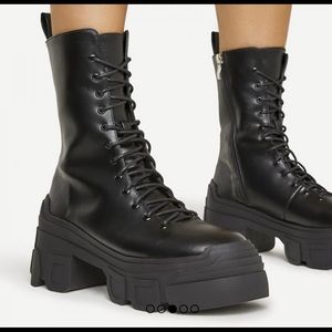 Chunky lace up black boots